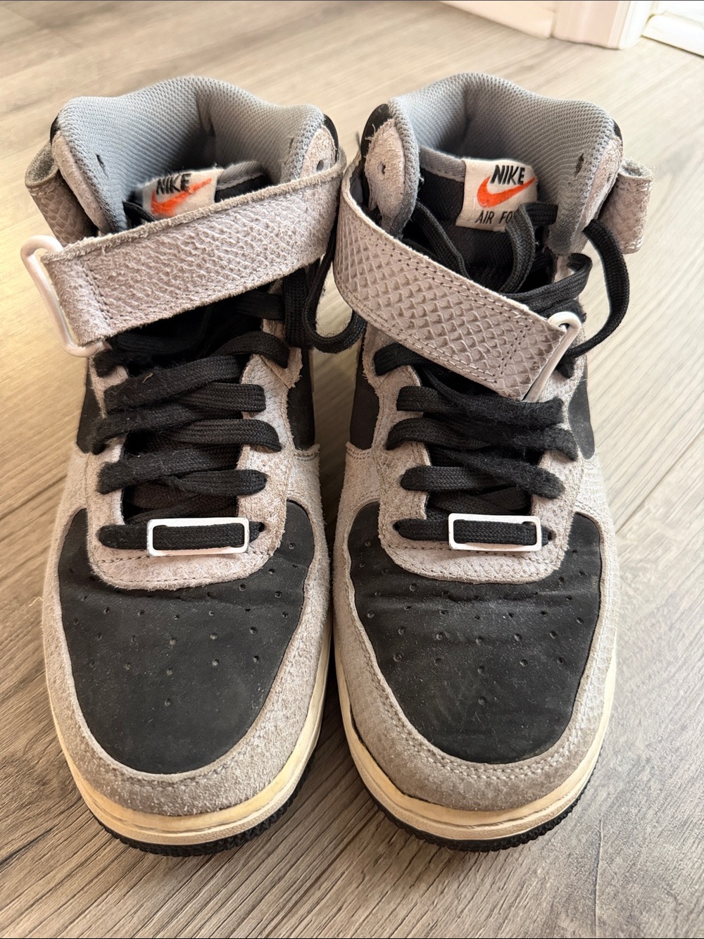 Nike Kids Black and Gray High-Top Sneakers with Orange Logo